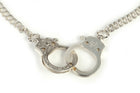 Jessica de Lotz JdL Jewellery Gladys Joyce Bowden Collection Closeup Large Functioning Handcuffs Necklace with Twin curb Chain Sterling Silver with Highlights in Gold