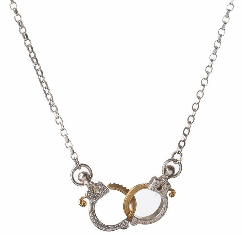 Jessica de Lotz JdL Jewellery Gladys Joyce Bowden Collection Mini Handcuff Necklace with Edwardian Pistol Engraving Closeup Sterling Silver with Gold Highlights