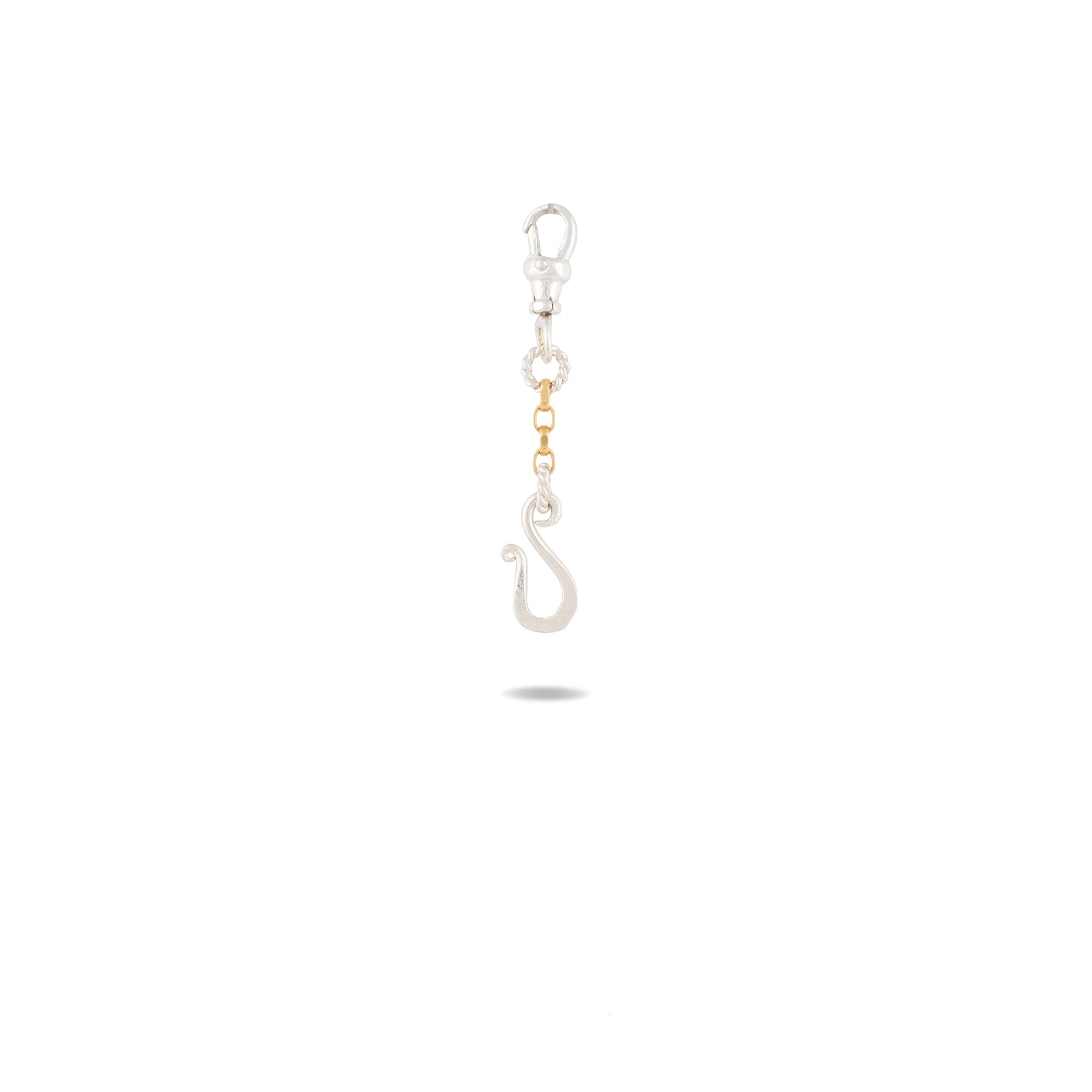 The Chatelaine Holding Hands Chain by Jessica de Lotz Jewellery—a silver keychain featuring a lobster clasp, a small gold link, and a prominent S-shaped hook charm—hangs centered on a white background, casting a faint shadow below.
