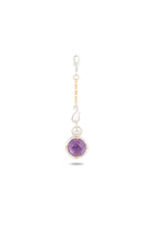 Certainly! Here’s a rewritten sentence using your product data: The ‘There’s A Little Witch In All Of Us’ Charm by Jessica de Lotz Jewellery features a round amethyst cabochon set within a distinctive silver and gold frame, suspended from an ornate chain with alternating silver and gold links, capturing the enchanting spirit of contemporary chatelaine accessories. Shown against a plain white background.
