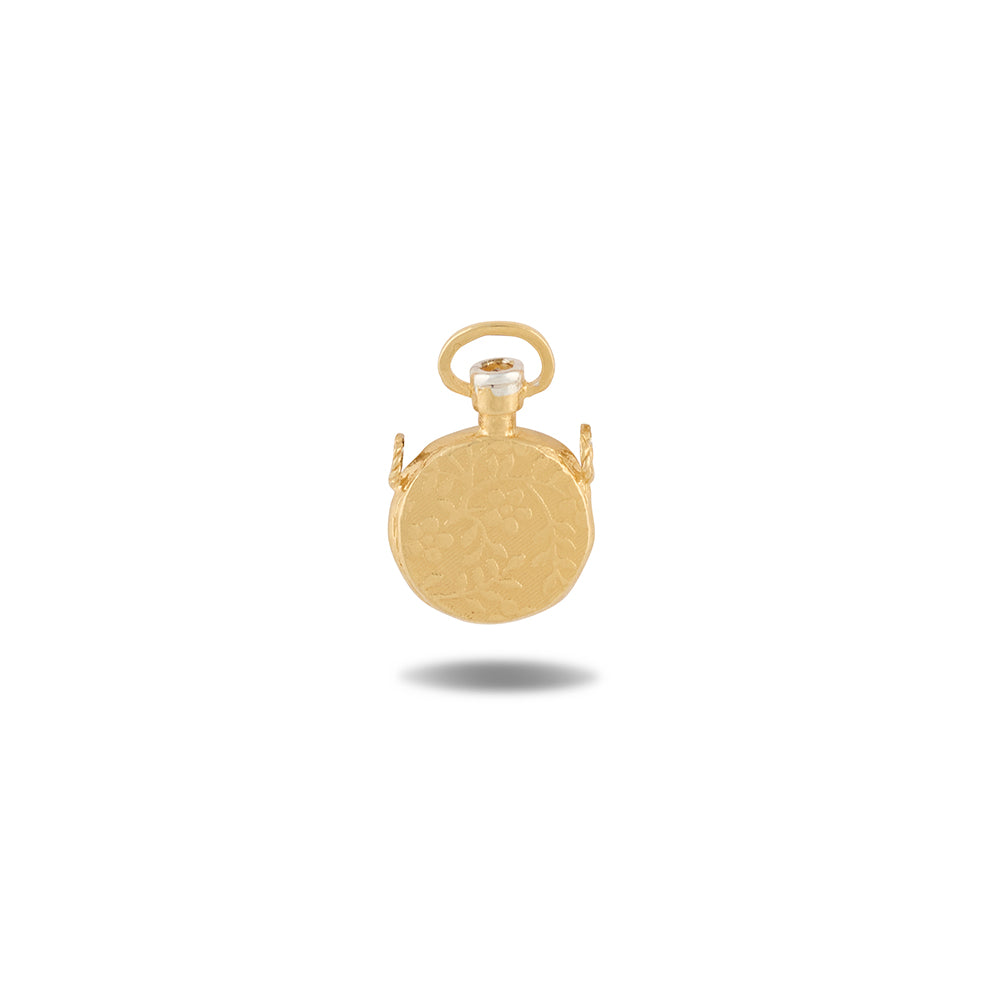 A delicate, round gold Apothecary Bottle Charm Necklace from Jessica de Lotz Jewellery’s limited edition Verbena Botanical collection is beautifully engraved with a floral pattern. This wax-seal-inspired pendant features a top loop for easy attachment to your favorite chain, as well as two small side brackets, and casts a subtle shadow on a white background.