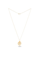 The Amas Veritas Spell Charm by Jessica de Lotz Jewellery is a delicate gold necklace with a fine chain, featuring a heart-shaped pendant adorned with a small crown detail—evoking the spirit of sisterhood charms. The piece is displayed on a white background, with a subtle shadow beneath the pendant.