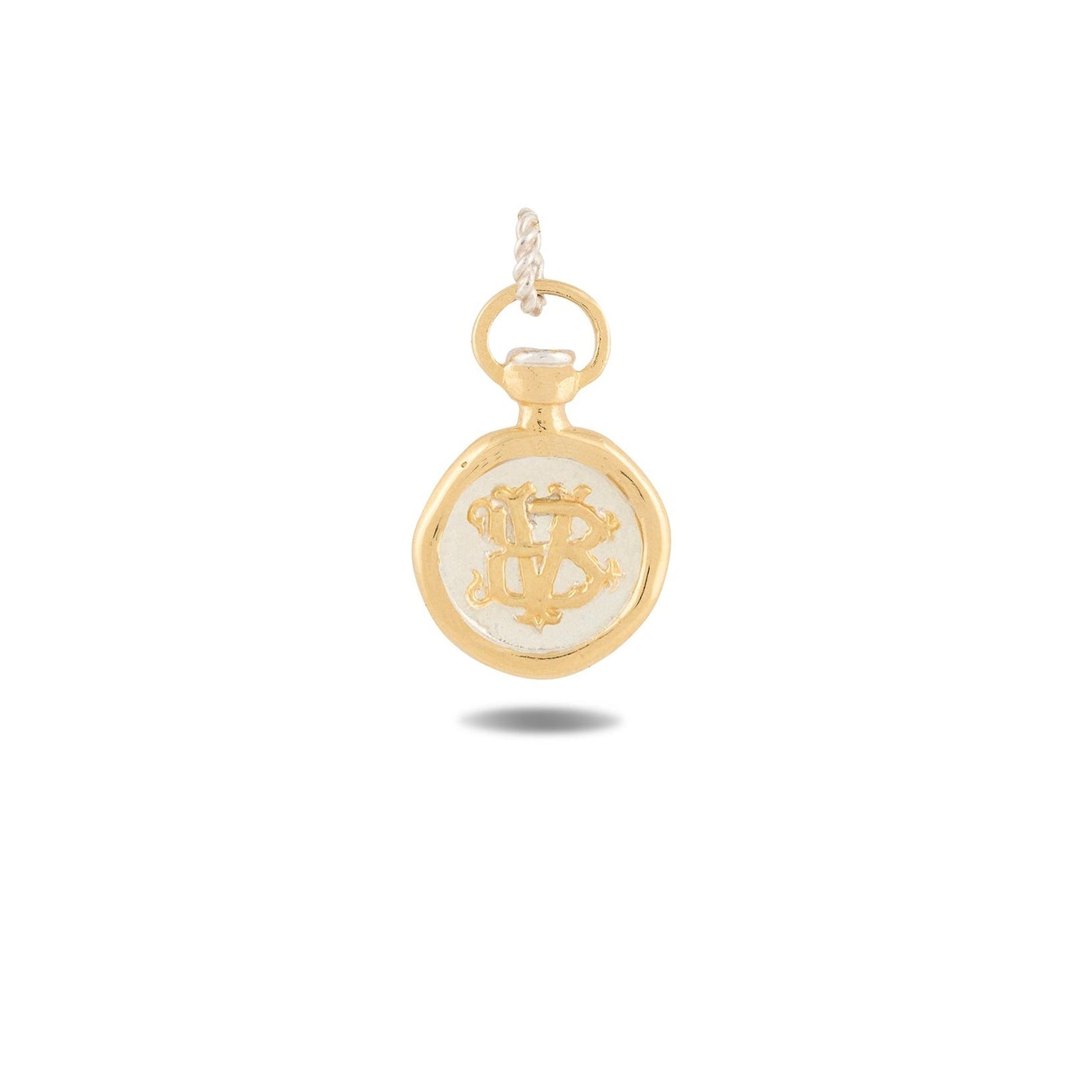 The Verbena Botanical Apothecary Bottle Charm by Jessica de Lotz Jewellery is a small gold and white round pendant with a loop for hanging, featuring an engraved script monogram on its front. Photographed against a white background with a subtle shadow below, this botanical wax-seal charm exudes elegance and timeless appeal, making it a beautiful addition to any sisterhood jewelry collection.