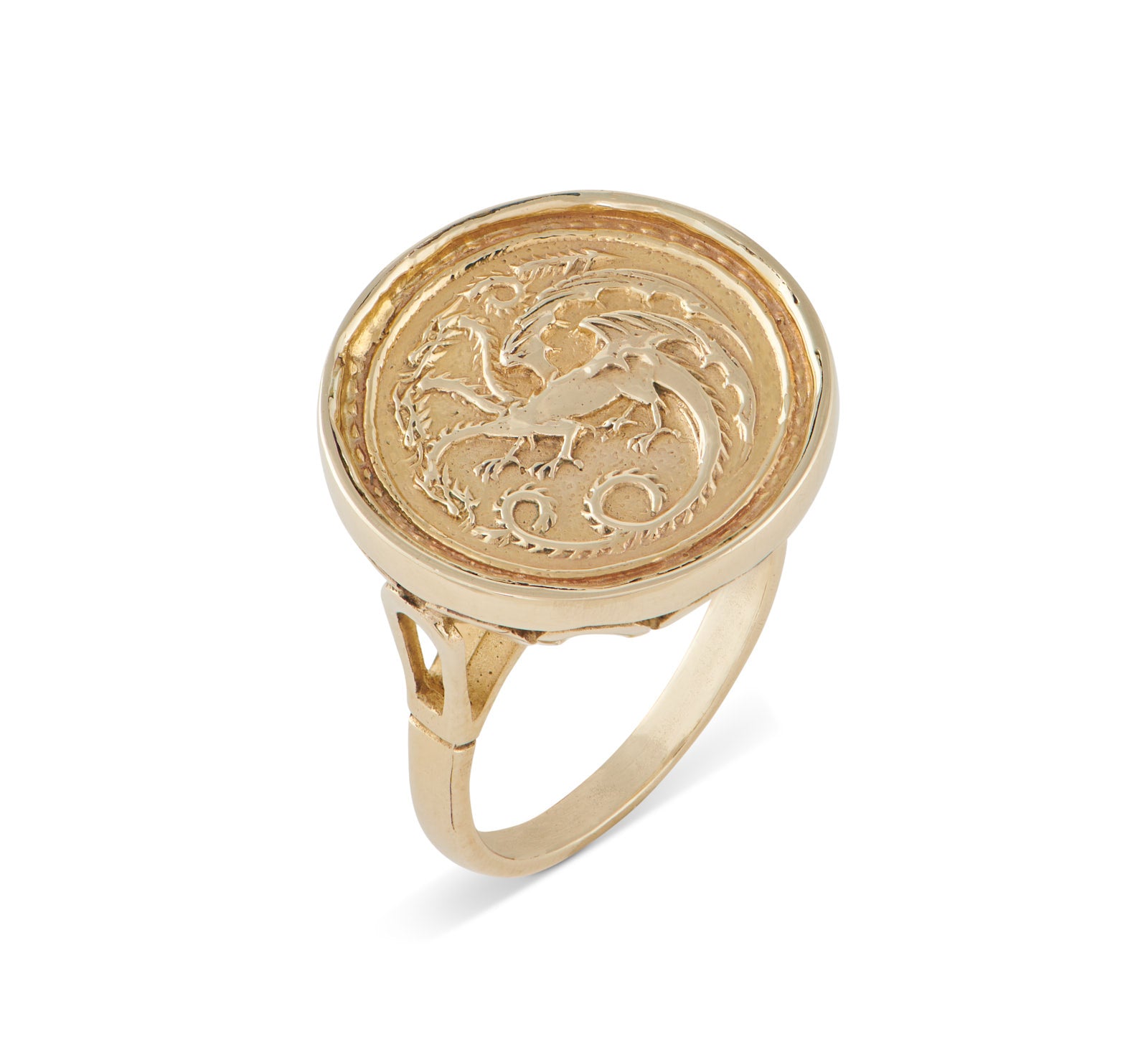 The House of the Dragon & JdL King Viserys I Targaryen Golden Dome Ring by Jessica de Lotz Jewellery features a gold, round flat top engraved with the Targaryen dragon crest, outstretched wings, curled tail, and a split band near the bezel.
