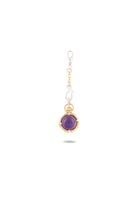 The ’There’s A Little Witch In All Of Us’ Charm by Jessica de Lotz Jewellery features a round amethyst cabochon set in a gold bezel and is attached to a silver chain adorned with small gold accents. Inspired by modern-day chatelaine accessories, the charm casts a faint shadow below on a white background.