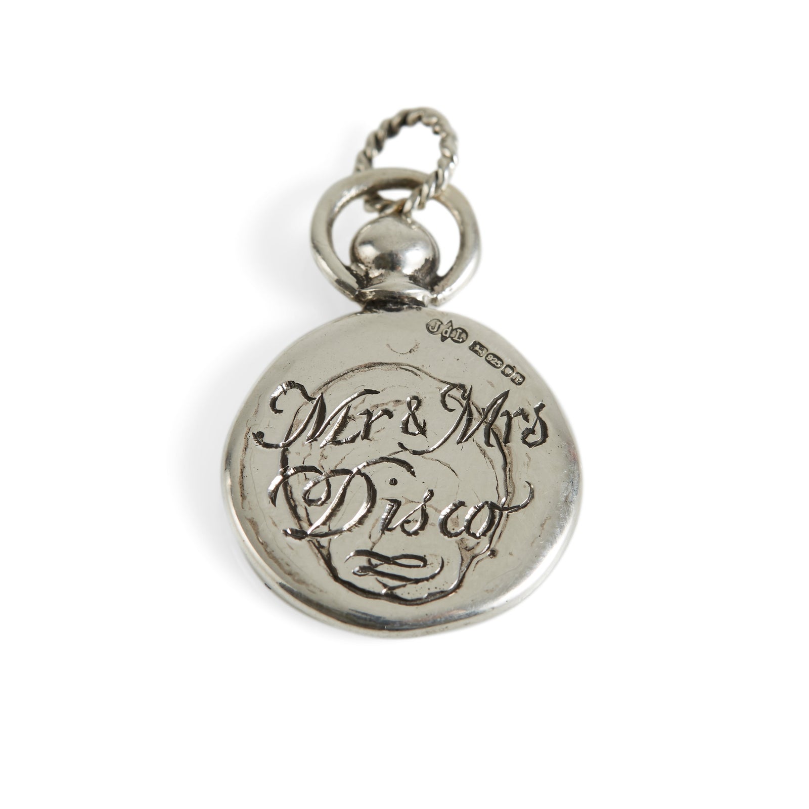 The Mini Personalised Wax Seal Charm by JdL Jewellery is a round silver pendant with a twisted loop, engraved in elegant script and featuring a shiny, reflective surface inspired by classic wax seal charms.