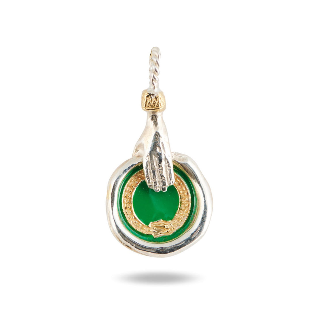 The Enamelled Ouroboros Charm from Jessica de Lotz Jewellery features a detailed silver hand above a green enamel center, encircled by a gold ouroboros and finished with a twisted silver bail—symbolizing new beginnings. Limited edition necklace.